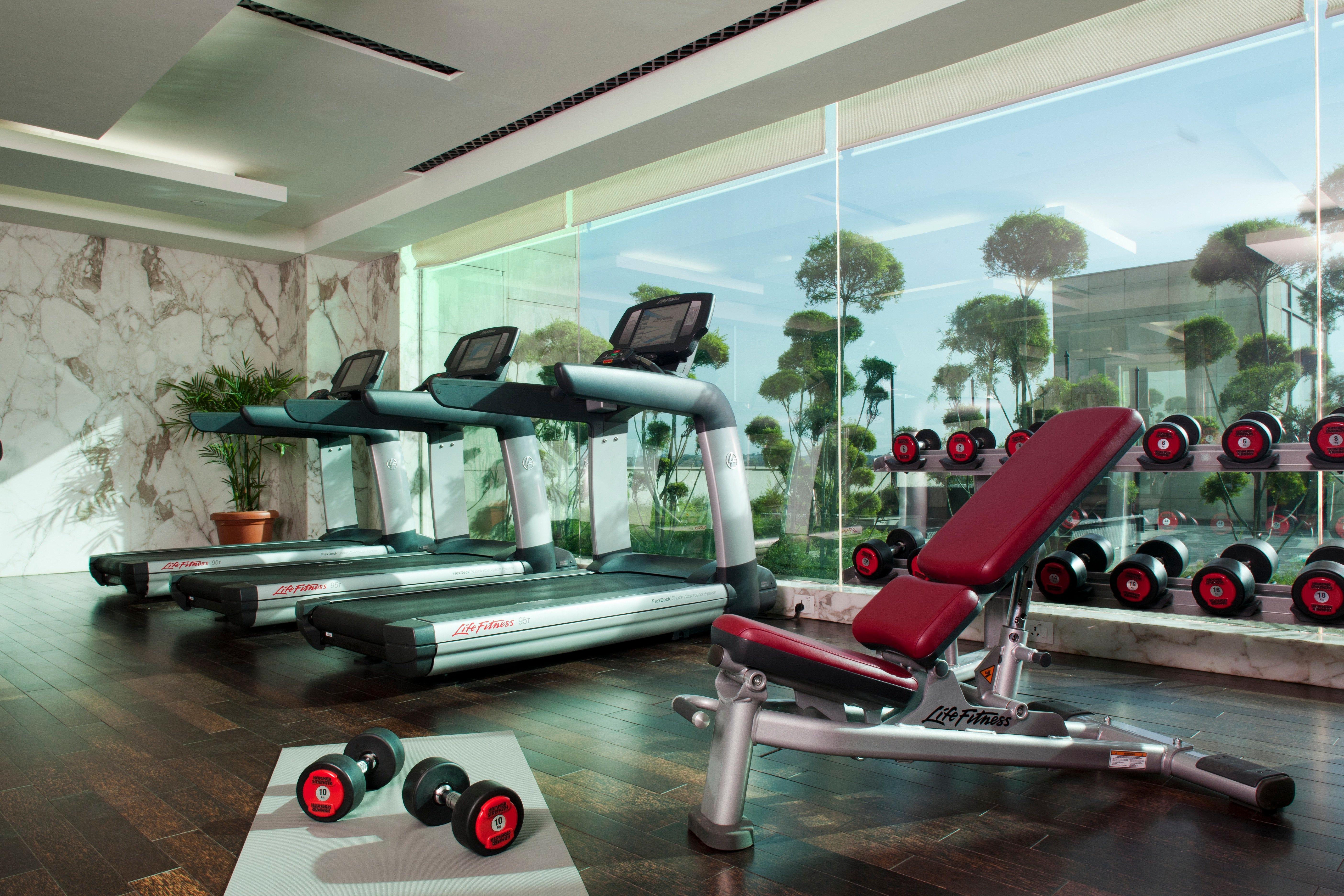 Hotel Crowne Plaza New Delhi Okhla By Ihg Servizi foto A modern gym